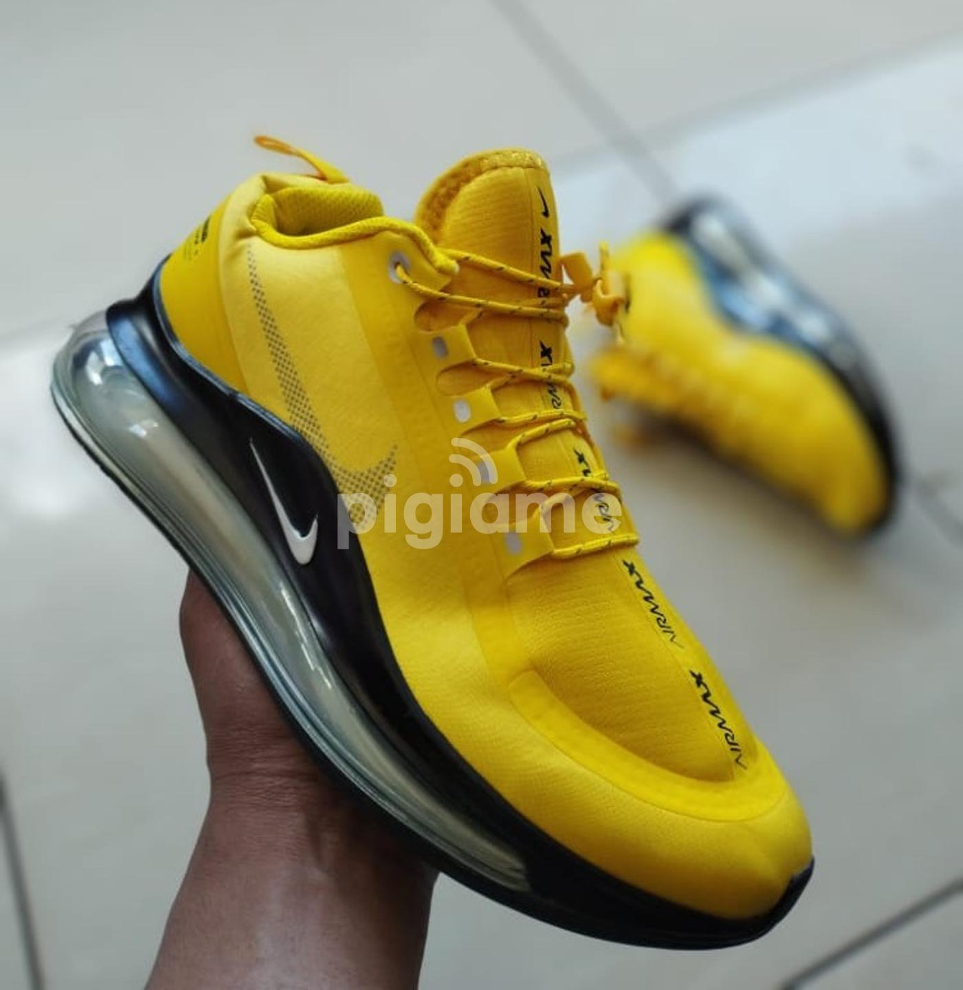 Nike utility yellow top