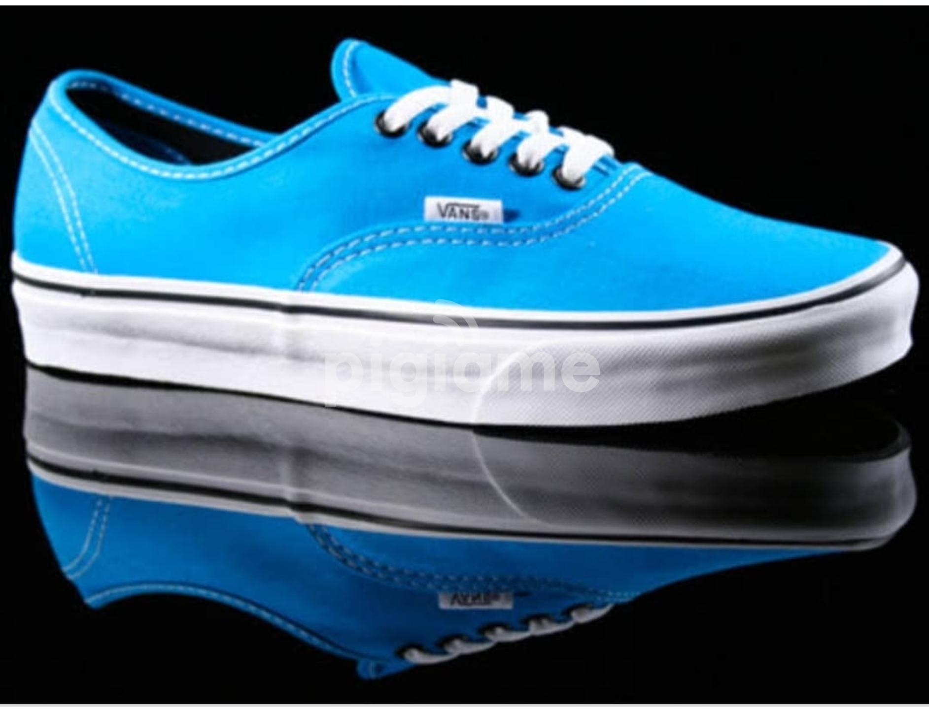 Blue vans new arrivals off the wall