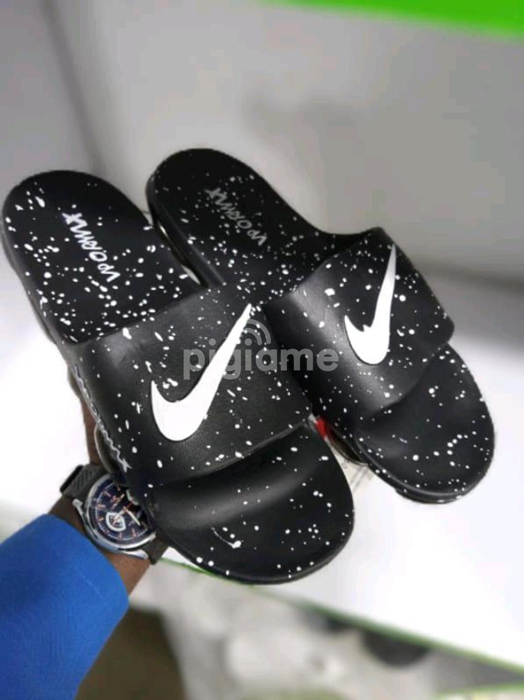 Nike vapormax slides price online