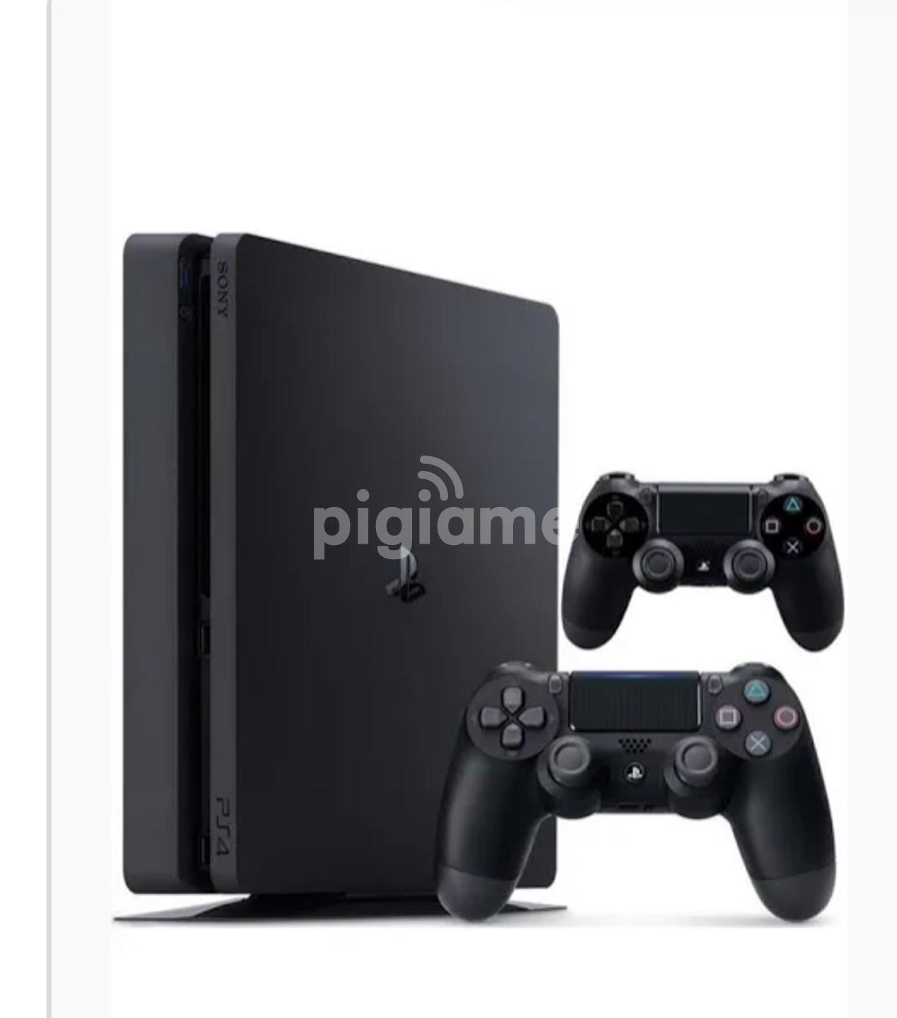 Ps4 Slim With 2 Controllers And Red Dead Redemption 2 in Nairobi