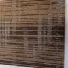 Brown Patterned carpet tile adding warmth to homes/ offices thumb 1