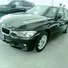 BMW 320i black thumb 1