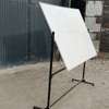 Rotational double sided whiteboards with a stand thumb 0