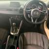 Mazda Demio sedan white thumb 4