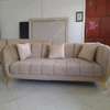 3 seater golden base tufted  couch thumb 0