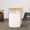 Glass spice / storage jar with spoon and bamboo lid thumb 0