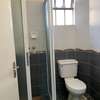 3 bedroom apartment master Ensuite with a cloakroom thumb 6