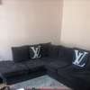 7 seater corner sofa with a matching Pouf. thumb 0