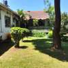 1 acre piece of land with 6 bedroom house. thumb 4