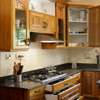 Meru oak kitchen cabinets &wardrobes installation thumb 2