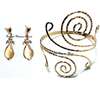 Womens Gold Tone Armlet with golden earrings thumb 0