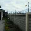 Electric Fence and Razor Wire Installation in Kenya thumb 6
