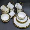 Quality ceramic dinner set with gold rim thumb 1