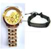 Gold Tone watch and Jesus leather bracelet thumb 1