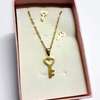 Womens Gold Tone Key pendant and earrings thumb 0