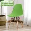 Plastic chairs: Green plastic eames dine chair thumb 1