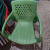 Plastic chair with metallic tubing legs. thumb 5