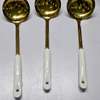Single golden serving spoon thumb 9