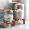 Glass cereal dispenser with a bamboo stand thumb 1