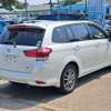 Toyota Corolla Sedan White Fuel Efficient Reliable thumb 1