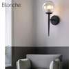 Upscale White and Glass, Black Globe Indoor Wall Sconce thumb 0