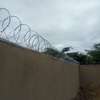wall top electric fencing installation in kenya thumb 3