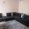 7 seater corner sofa with a matching Pouf. thumb 1