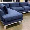 L shape sofa with bouncy cushions and lower wooden skirting thumb 0