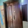 double door in brown walnut with a wooden finish thumb 0