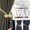 MAGNETIC CURTAIN HOLDERS thumb 1