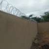 wall top electric fencing installation in kenya thumb 1
