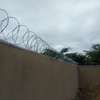 wall top electric fencing installation in kenya thumb 2