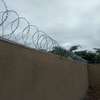wall top electric fencing installation in kenya thumb 5