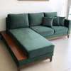 L shape sofa with bouncy cushions and lower wooden skirting thumb 1