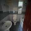 3 bedroom apartment master Ensuite with a cloakroom thumb 2