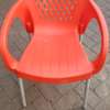 Plastic chair with metallic tubing legs. thumb 2