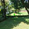 1 acre piece of land with 6 bedroom house. thumb 2