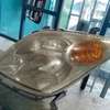 Toyota IST 2003 model lhs headlight thumb 1
