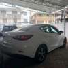 Mazda Demio sedan white thumb 0