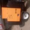 Compressor trialer mounted thumb 2