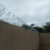 wall top electric fencing installation in kenya thumb 8