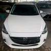 Mazda Demio sedan white thumb 8