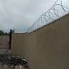 wall top electric fencing installation in kenya thumb 13