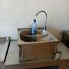 Knee operated wall mounted hands washing basin thumb 1
