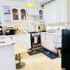 Modern Airbnb Apartment with Bright Kitchen & Open Living thumb 1