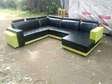 Leather L-shaped sofas with matching coffee table