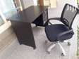 Office desk with adjustable secretarial chair