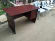Writing office desk with a grommet