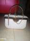Gold and white sling bag