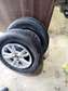14" Inch alloy rims and tires 185/70R14 Brand New